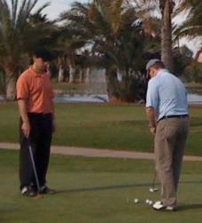 Jaacob Giving a Putting Lesson