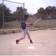 Jaacob Bowden playing baseball in 2002