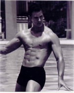 Jaacob Bowden poses during a fitness model photo shoot in a pool in 2002