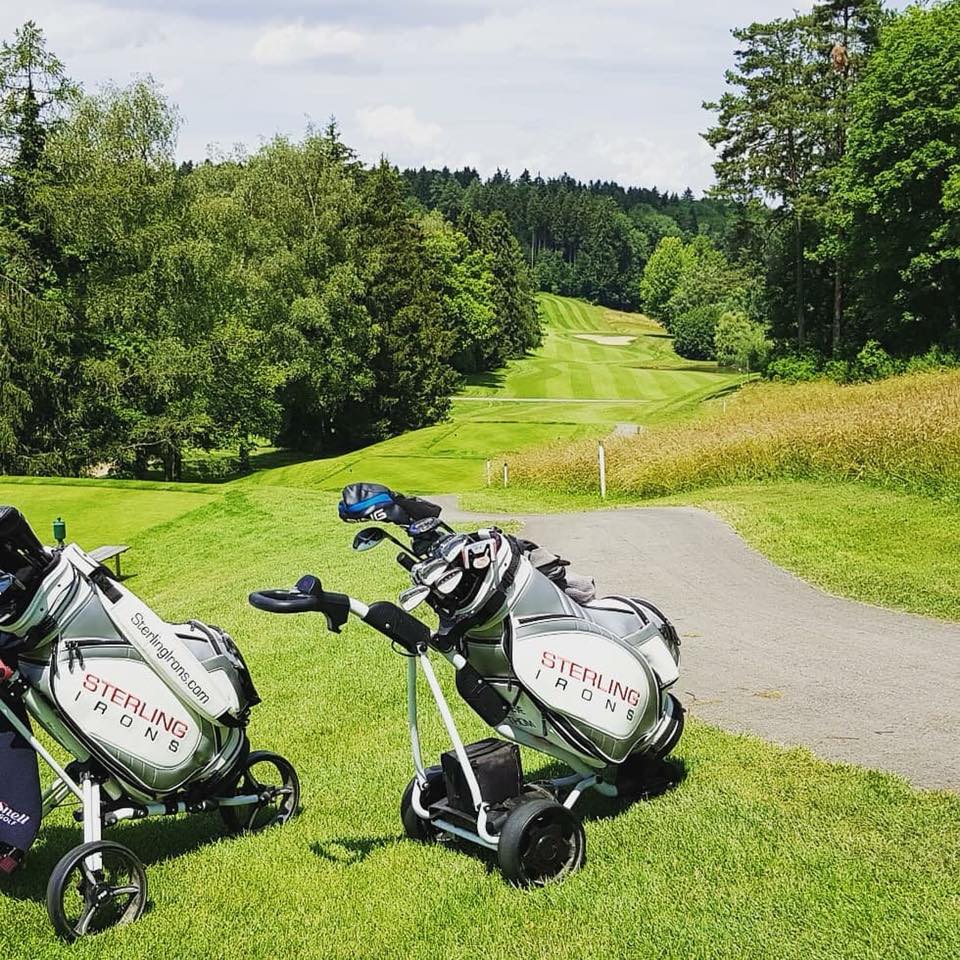 Two Sterling Irons golf bags over look a hole at Golf Club Breitenloo in Zurich, Switzerland